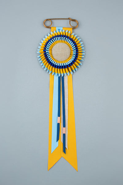 Navy, yellow and light blue rosette
