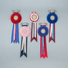 Blue, red and white stripe rosette